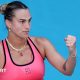 Aryna Sabalenka celebrates winning a point with a clenched fist