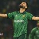 Abrar Ahmed looks up to the sky as he celebrates taking a wicket