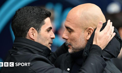 Arsenal manager Mikel Arteta embracing Manchester City boss Pep Guardiola