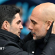 Arsenal manager Mikel Arteta embracing Manchester City boss Pep Guardiola