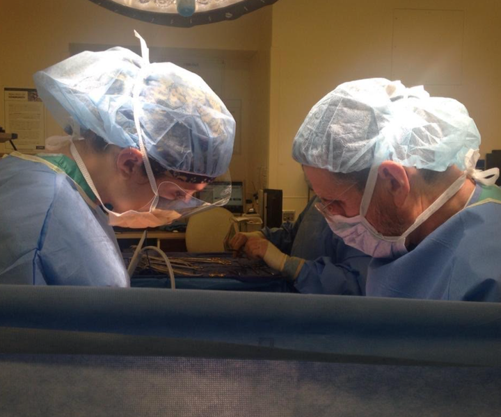 The author, left, in the operating room.