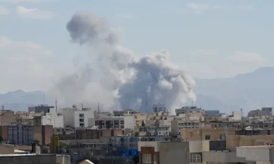 Smoke rises up after a strike in Tehran, Iran, Sunday, March 1.