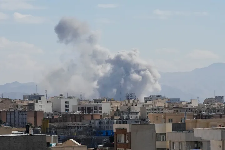 Smoke rises up after a strike in Tehran, Iran, Sunday, March 1.