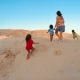 The author and her family on a beach walk in Andalucia, Spain