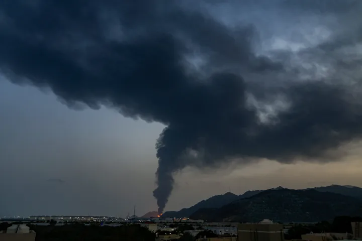 Fire and a plume of smoke is visible after, according to authorities, debris of an Iranian intercepted drone hit the Fujairah oil facility, in Fujairah, United Arab Emirates, March 3, 2026.