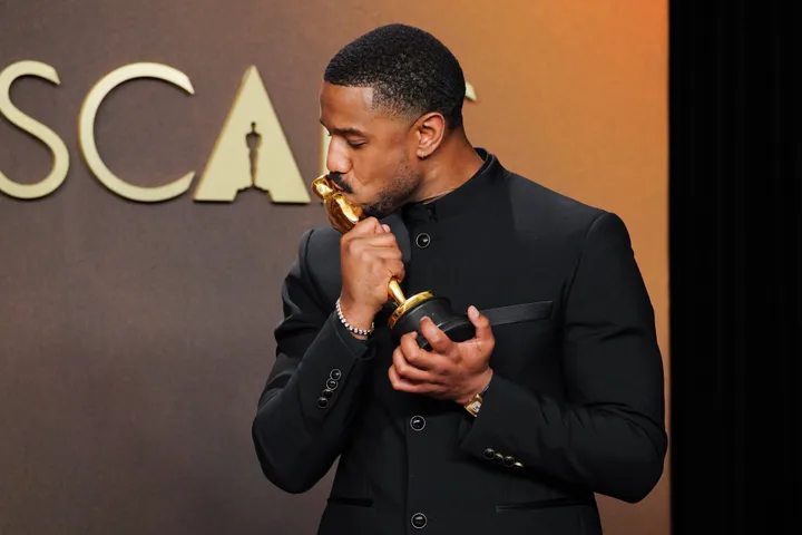 Michael B. Jordan poses with his Oscar following Sunday's ceremony