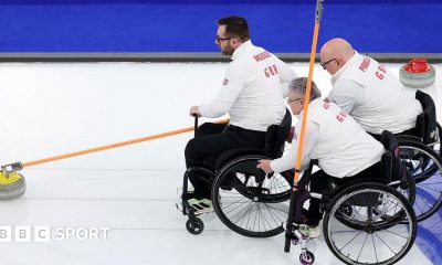 Austin McKenzie delivers a stone supported by Karen Aspey and Stewart Pimblett