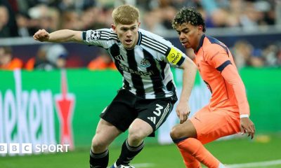 Lewis Hall is challenged by Lamine Yamal during Newcastle United's game against Barcelona at St James' Park on 10 March, 2026