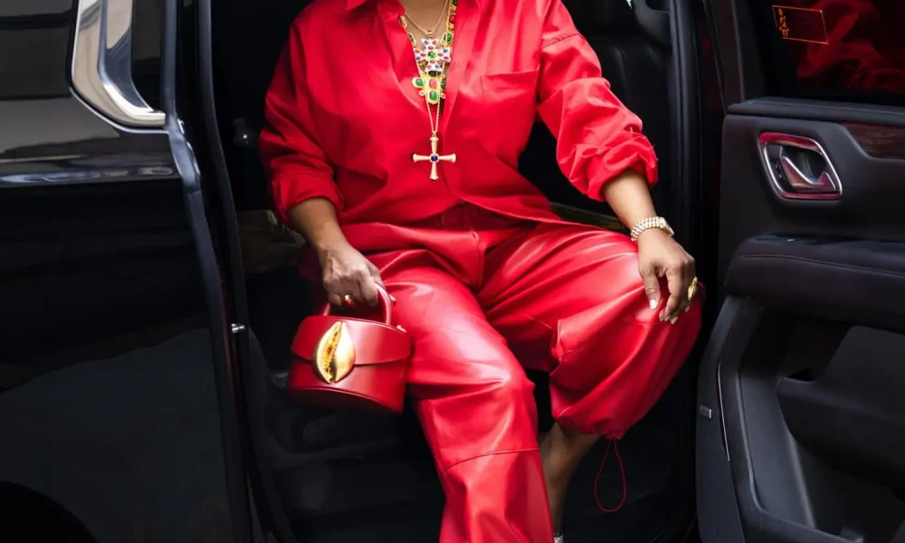 90909 Bomb Accessories Kandi Burruss In Red With A Flore K NY Bag On The Kelly Clarkson Show