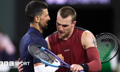 Novak Djokovic and Jack Draper hug at the net after their match at Indian Wells