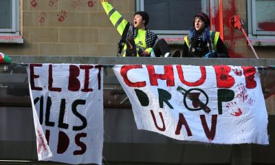 People Against Genocide take action at Chubb's Manchester office