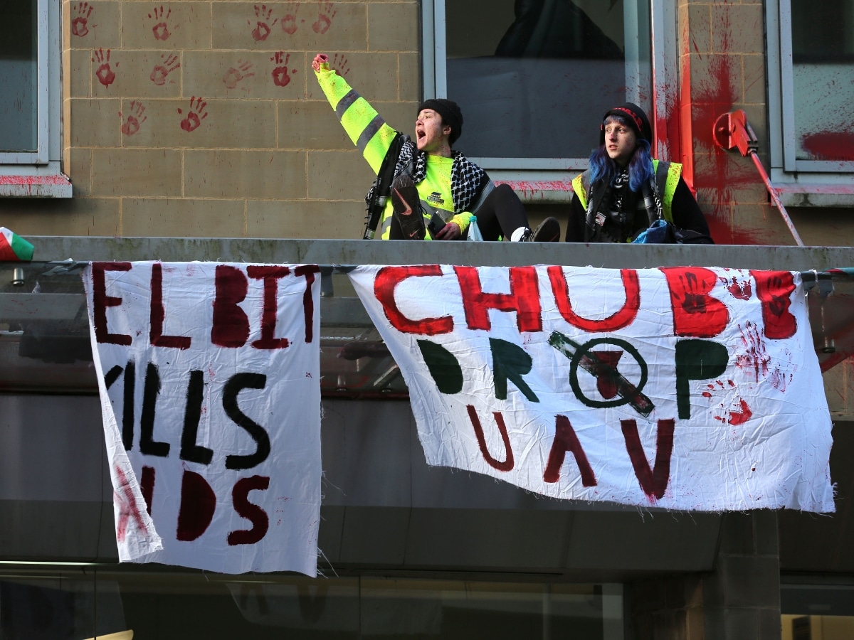 People Against Genocide take action at Chubb's Manchester office