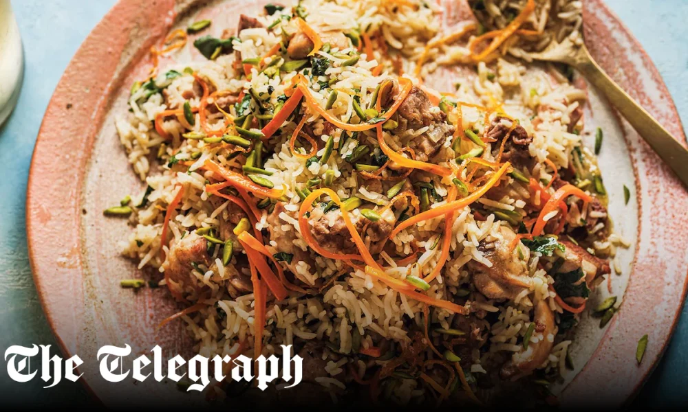 Chicken pilaf with cardamom, carrot and orange