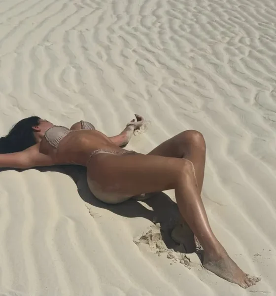 Kylie Jenner Poses in the Sand While Rocking a Tan-Colored Bikini on Vacation: 'DND'