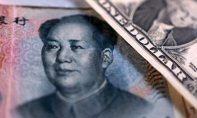 China encourages dollar buying to slow surging yuan