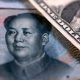 China encourages dollar buying to slow surging yuan