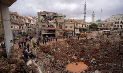 Israel warns Lebanon of ’heavy price’ as bombardment pounds Beirut suburbs