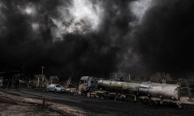 Trump says US could escort ships through strait as oil prices roil global economy