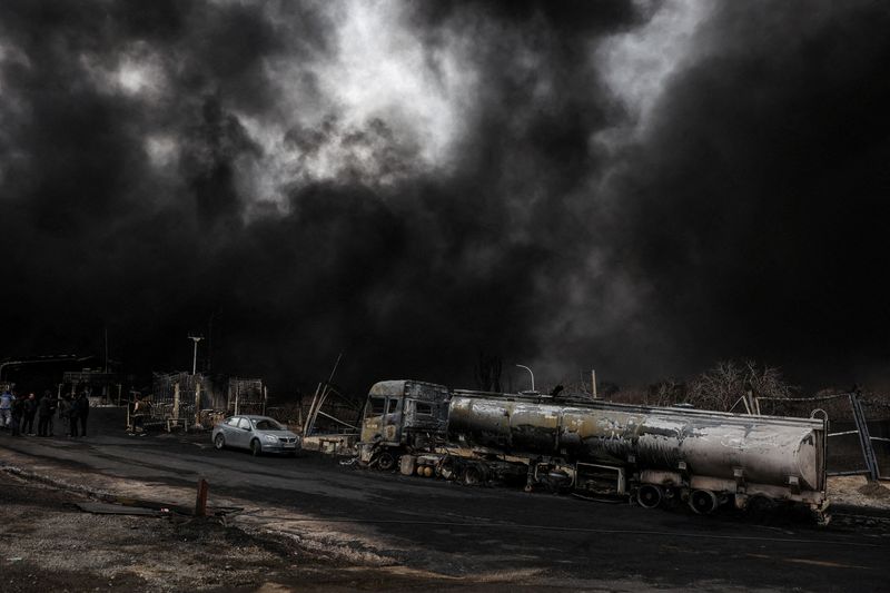 Trump says US could escort ships through strait as oil prices roil global economy