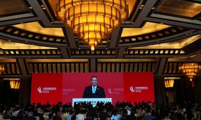 China pledges more balanced trade and further opening of the economy after record surplus