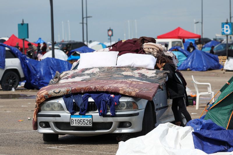 Israel strikes main bridge in south Lebanon, orders destruction of homes near border