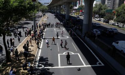 Soccer-Mexican protesters turn highway into football pitch to slam World Cup ’dispossession’