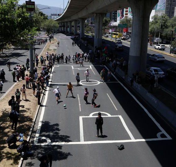 Soccer-Mexican protesters turn highway into football pitch to slam World Cup ’dispossession’