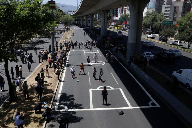 Soccer-Mexican protesters turn highway into football pitch to slam World Cup ’dispossession’
