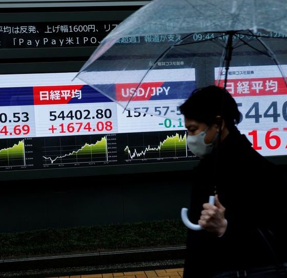 Stocks slide in Asia, Brent crude heads for record monthly rise
