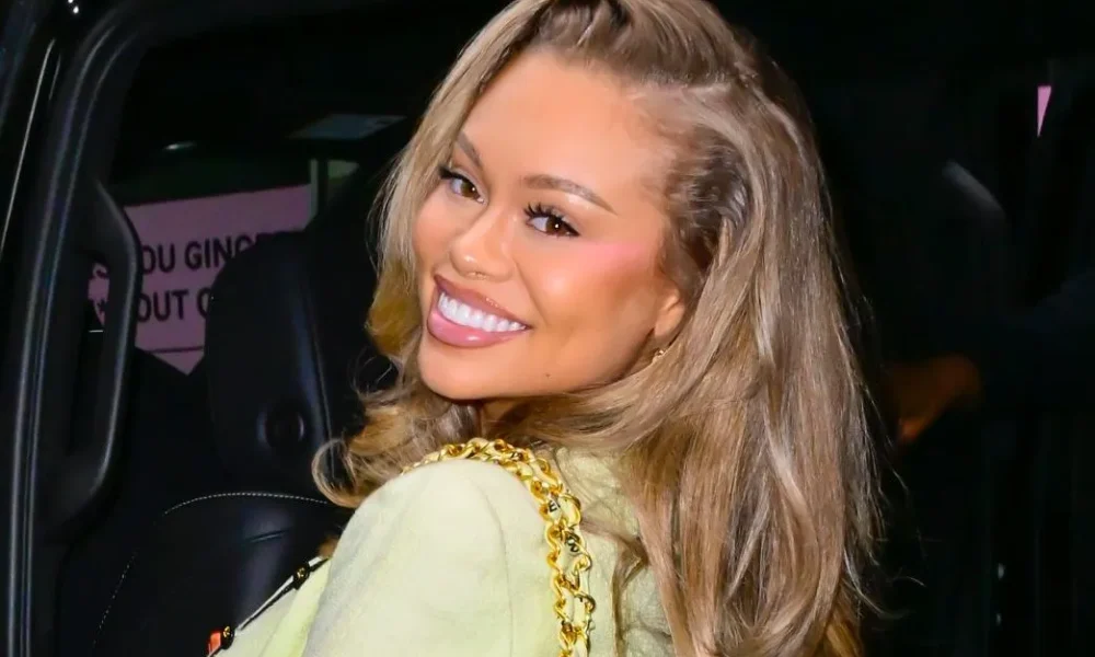 Latto Seemingly Confirms Pregnancy With Baby Bump Reveal In 'Business & Personal' Music Video