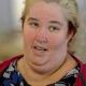 Mama June shows off her impressive weight loss as she arrives in LA with Papa Bear
