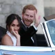 The Duke and Duchess of Sussex drive in an electric Jaguar car