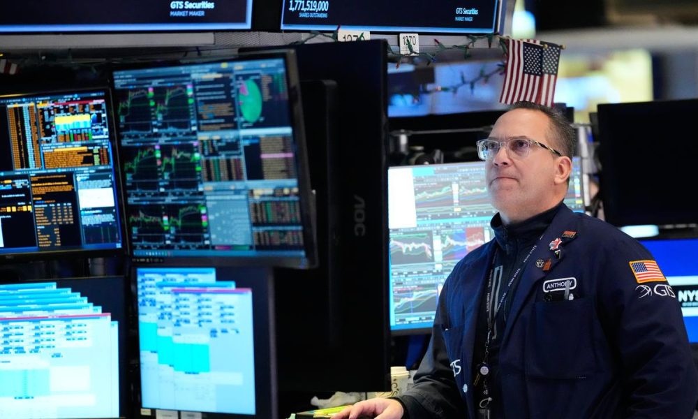 Wall Street closes down as oil prices spike on Mideast