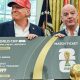 US President Donald Trump and Uefa president Gianni Infantino pose with a giant mock World Cup ticket