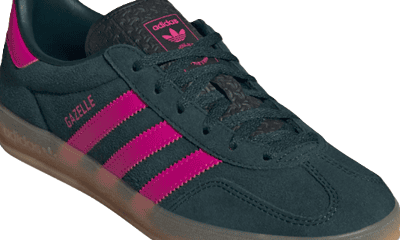 Gazelle sneaker with hot pink stripes and a dark navy? green? solid part