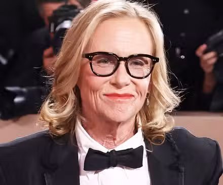 Amy Madigan smiling on the red carpet