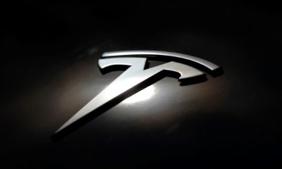 GameStop shares have soared in a clash between a new activist movement and hedge funds