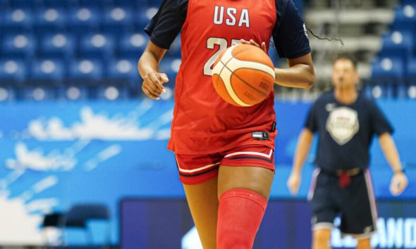 Angel Reese with Team USA basketball.