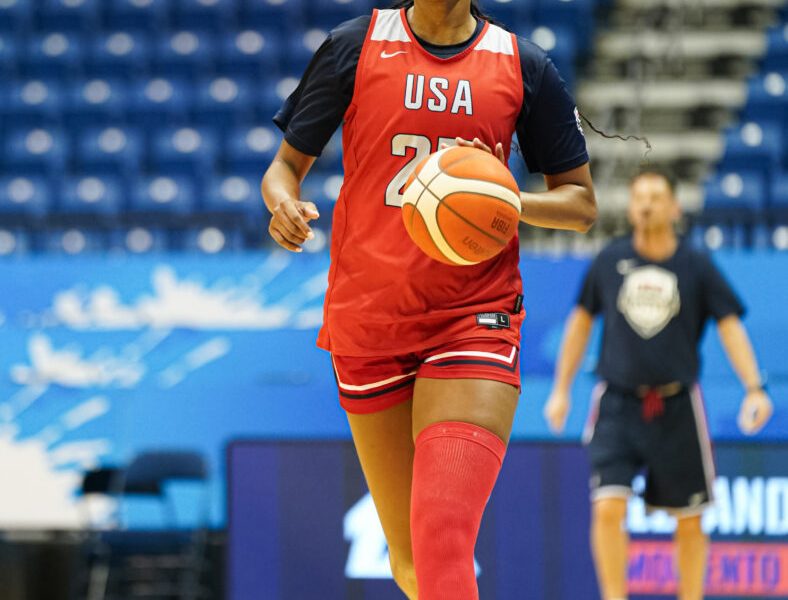 Angel Reese with Team USA basketball.