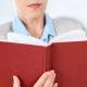 woman manager reading a great book on leadership for women