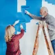 Couple renovating their home using money from equity release lifetime mortgage