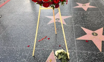 chuck norris fans pay tribute at hollywood walk of fame star after his death