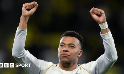 An AI-generated image of Kylian Mbappe skiing while holding his turtle