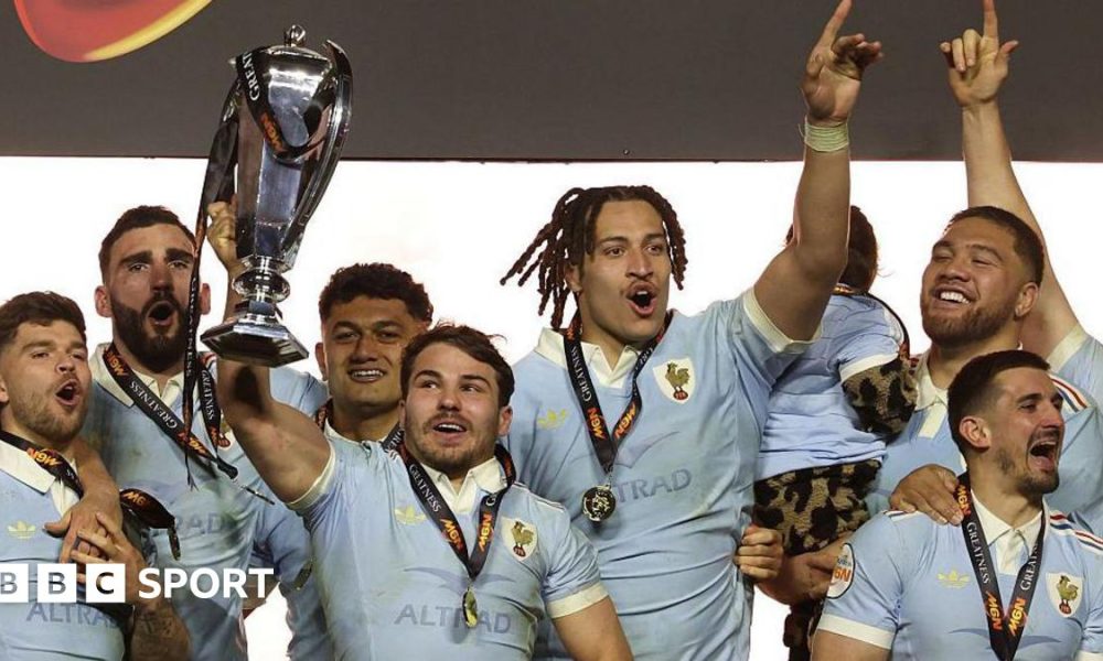France players lift the Six Nations trophy after the 48-46 win over England
