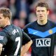 Michael Owen and Michael Carrick playing for Manchester United