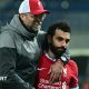 Liverpool boss Jurgen Klopp (left) embraces Mohamed Salah (right) after a Chamoions League match
