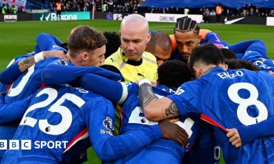 Paul Tierney in the middle of Chelsea's huddle
