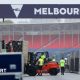 Workers prepare for the 2026 Australian Grand Prix