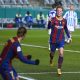 Frenkie de Jong of FC Barcelona celebrates scoring his team's opening goal with team mates during the Supercopa de Espana Semi Final match between Real Sociedad and FC Barcelona at Estadio Nuevo Arcangel on January 13, 2021 in Cordoba, Spain.