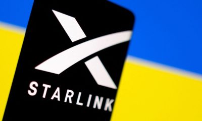 Illustration shows Starlink logo and Ukraine flag